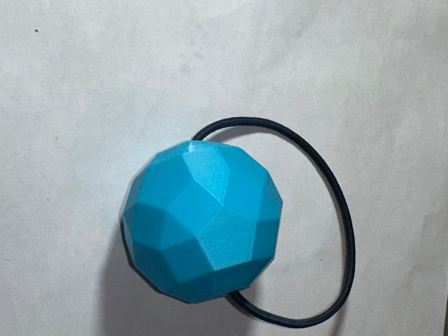 Colossal sphere sphere ponytail holder